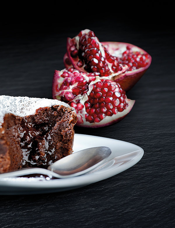 Airy light chocolate soufflé with pomegranate seeds